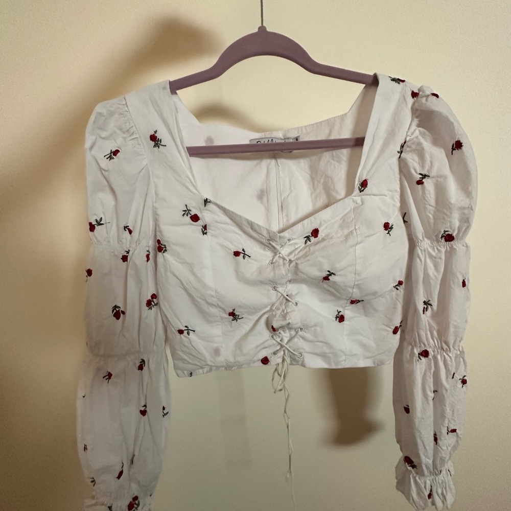 Flamenco style top w/ embroidered rose details & lace up front @ zipper back